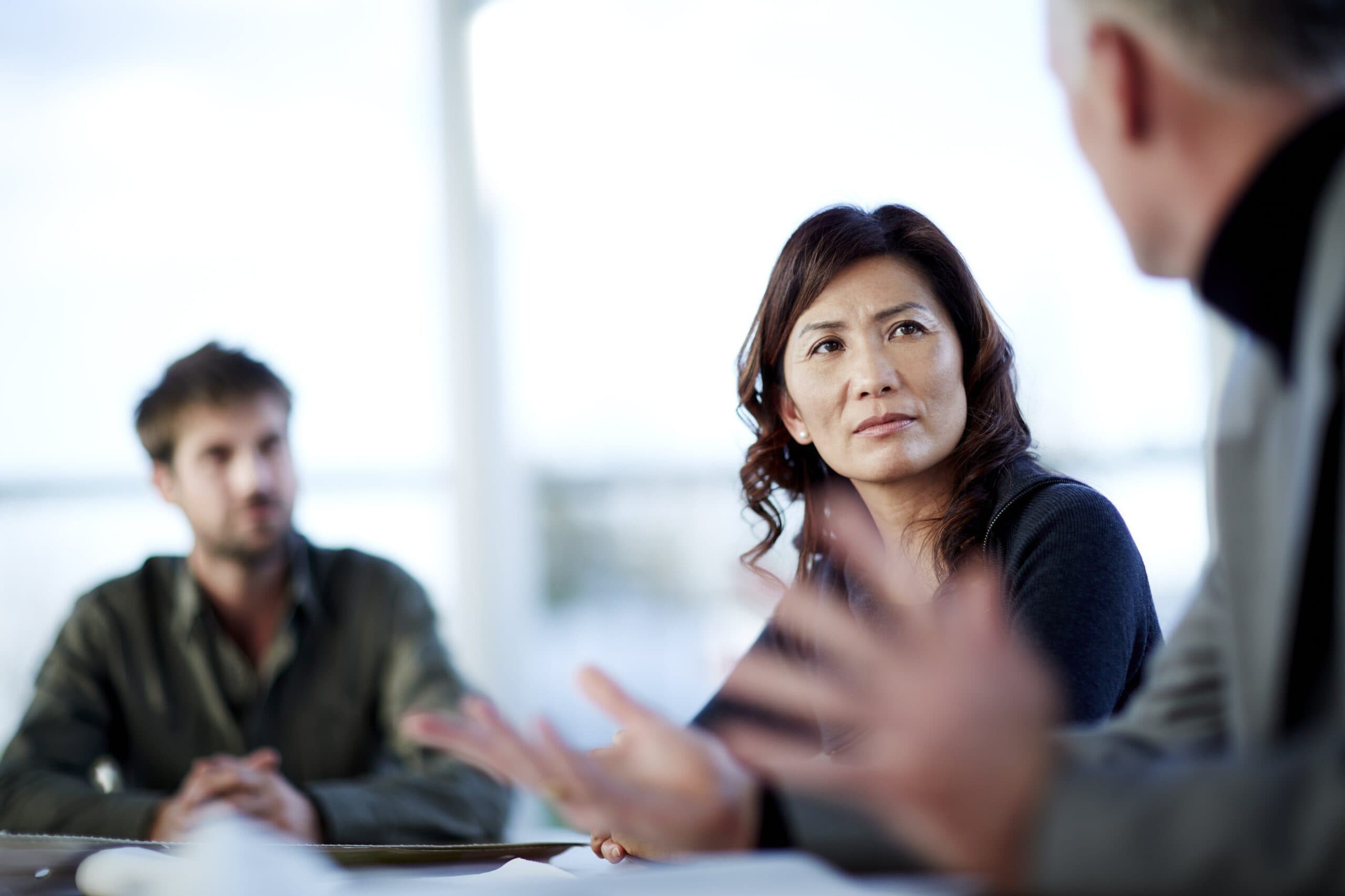 Two people in conversation across a table